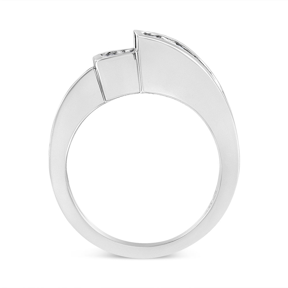 White metal ring with white baguette and princess shape gemstones set in channel and invisible settings, side profile view.