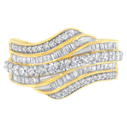 Close-up front view of a yellow metal ring featuring wavy rows of white round gemstones in prong settings and white baguette gemstones in channel settings.