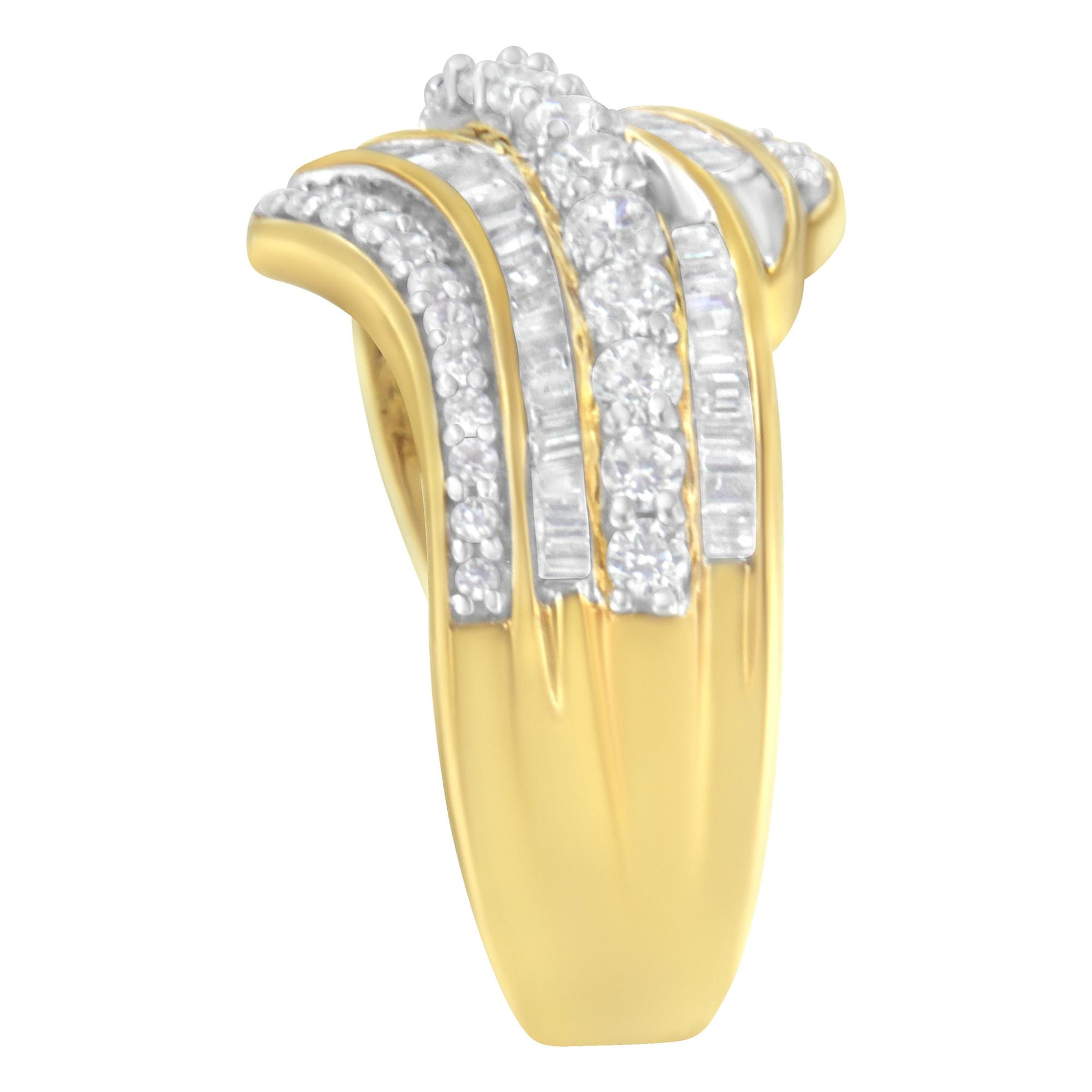 Close-up front angle of a yellow metal ring featuring alternating rows of round white gemstones in prong settings and baguette white gemstones in channel settings.