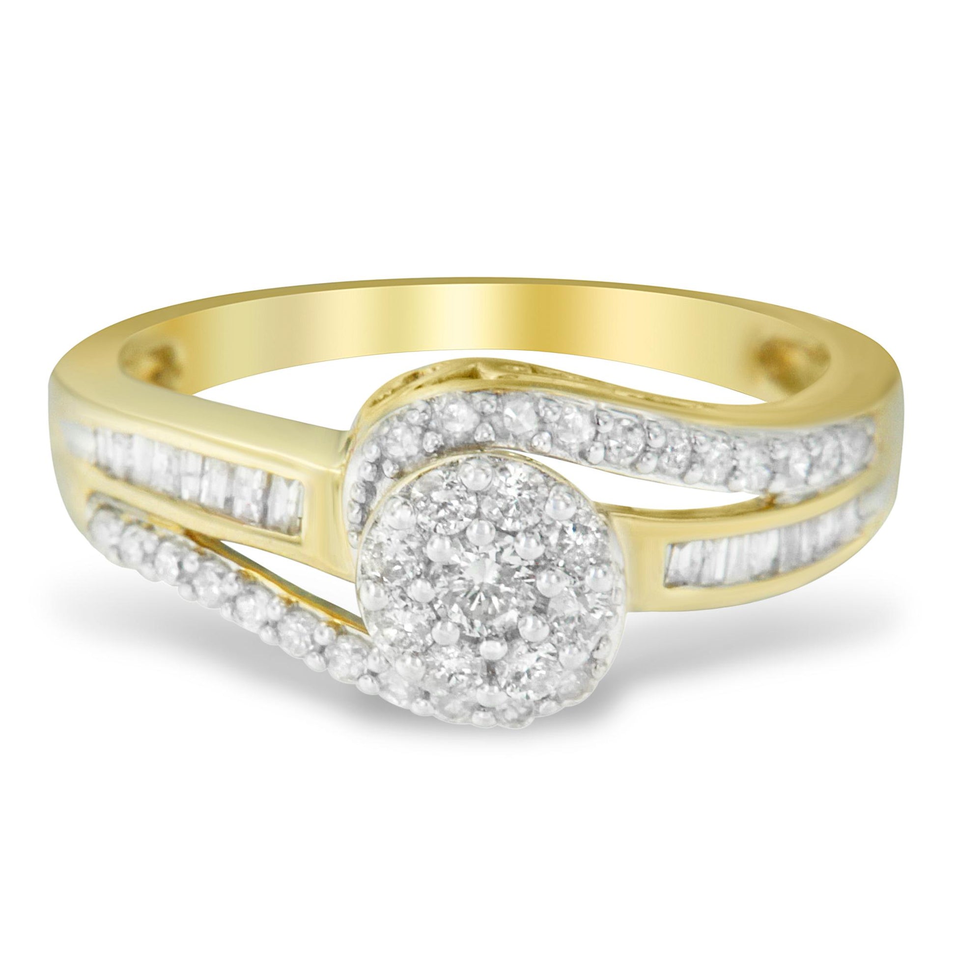 Yellow metal ring with a round cluster of white gemstones at the center, accented by curved rows of round white gemstones and straight rows of baguette white gemstones, shown in a close-up front angle.