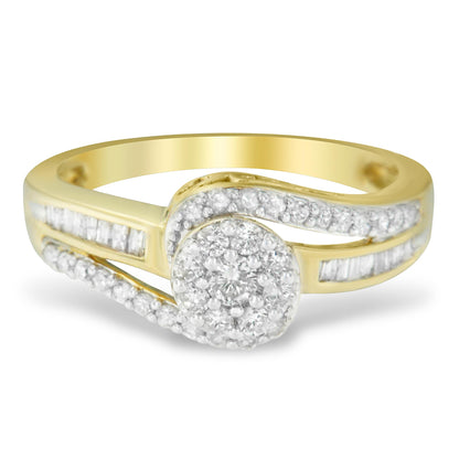 Yellow metal ring with a round cluster of white gemstones at the center, accented by curved rows of round white gemstones and straight rows of baguette white gemstones, shown in a close-up front angle.
