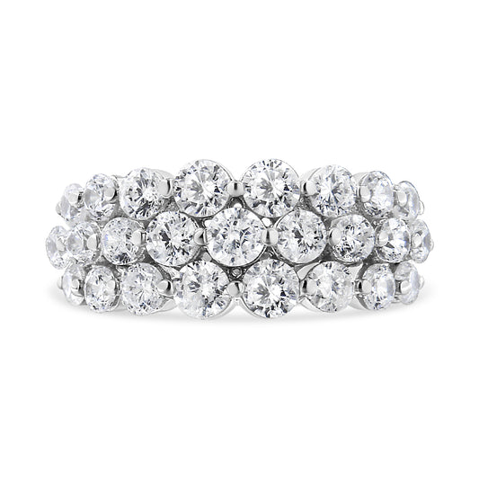 Front view of a white metal ring set with multiple round white gemstones in 2-prong settings arranged in three rows.