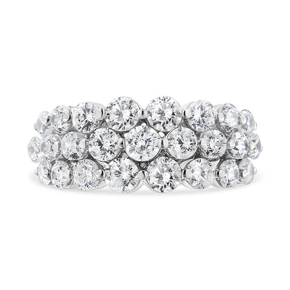 Close-up front view of a white metal ring featuring three rows of round white gemstones in two-prong settings.