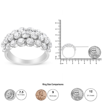 White metal ring with multiple round white gemstones in 2-prong settings, shown from a front angle and side view on a ruler for size reference.