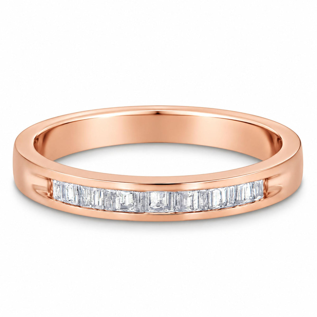 Angled view of 10K rose gold over .925 sterling silver band ring showcasing baguette-cut channel-set diamonds, white background