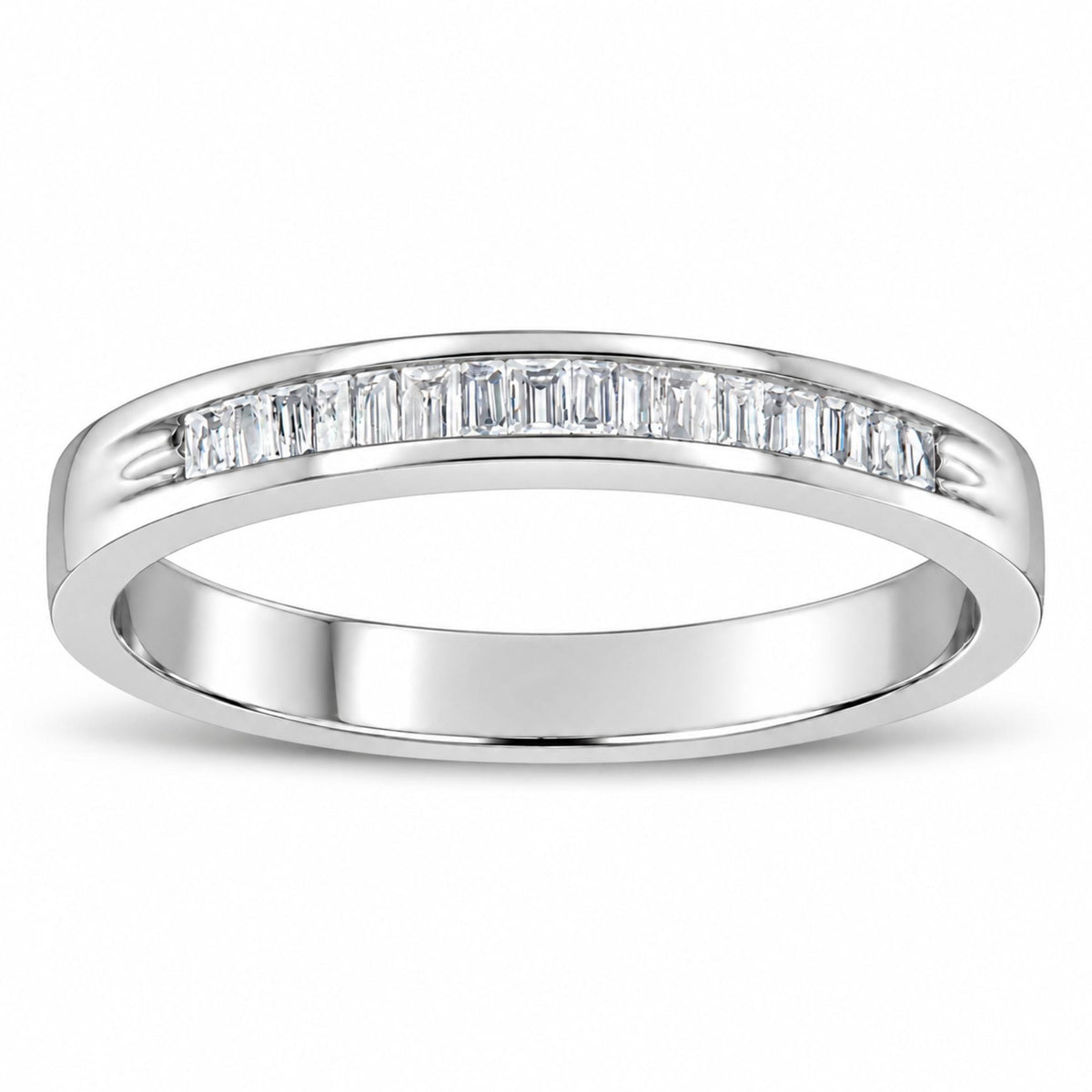 Angled view of 925 sterling silver stackable band ring with baguette cut diamonds in channel setting on white background