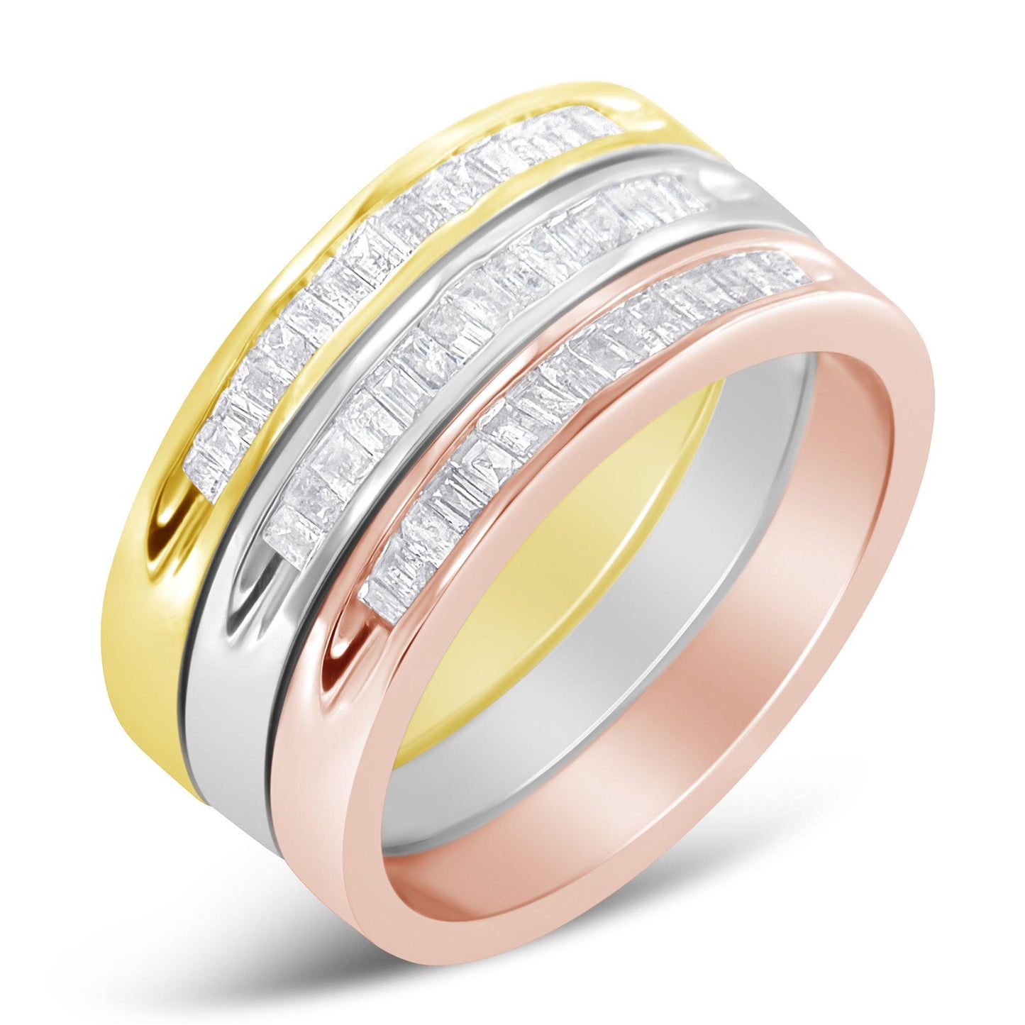 Close-up angled view of three rings stacked together in yellow, white, and rose metal colors, each featuring a row of white baguette-shaped gemstones set in a channel setting across the top.