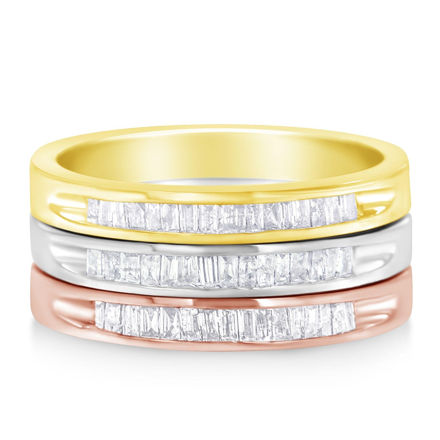 Front-facing stacked view of three rings in yellow, white, and rose metal colors, each featuring a row of white baguette-shaped gemstones set in a channel setting.