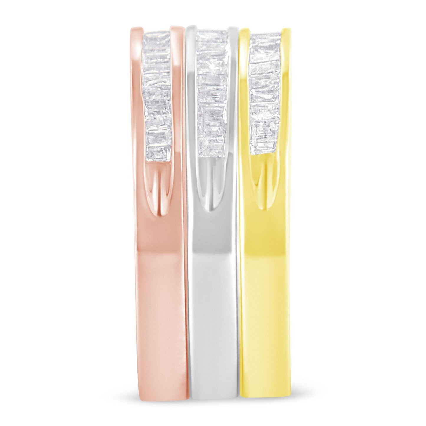 Front view of three rings in rose, white, and yellow metal colors with vertical rows of channel-set baguette-shaped white gemstones.