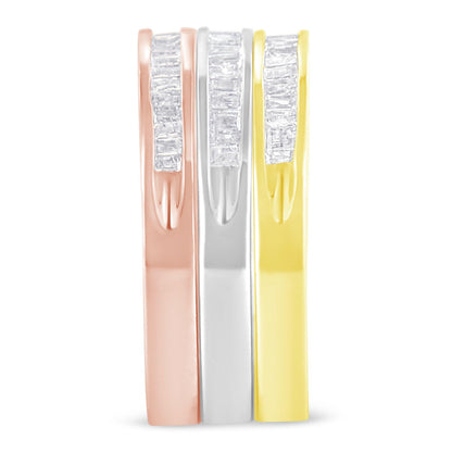 Front view of three rings in rose, white, and yellow metal colors with vertical rows of channel-set baguette-shaped white gemstones.