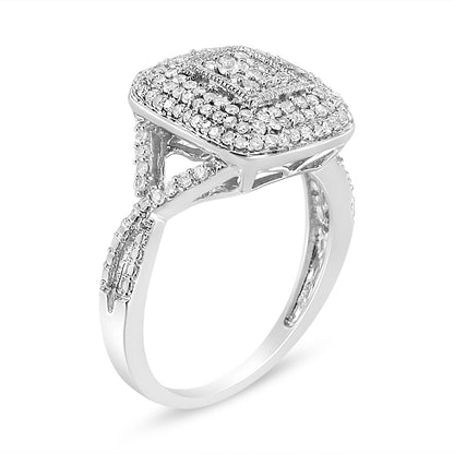 White metal ring with a square cluster of small round white gemstones set in prongs, shown at an angled side view.