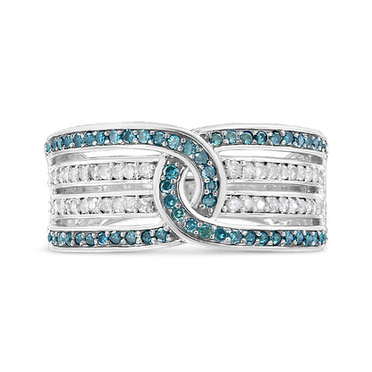 White metal ring with intertwined design featuring rows of round white and blue gemstones in a pave setting, shown from the front angle.