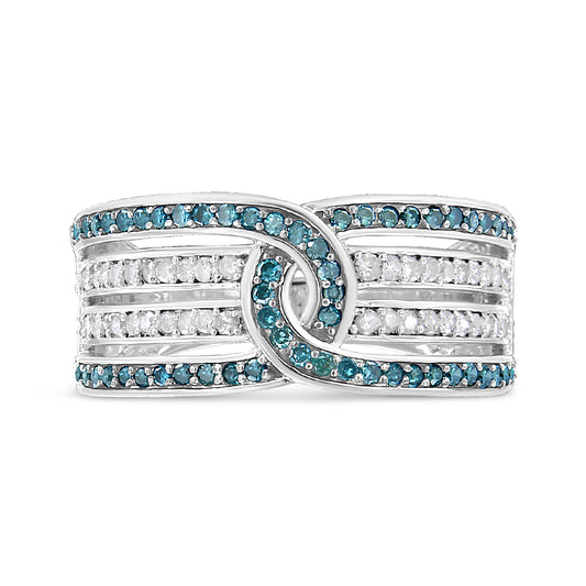 White metal ring with intertwined design featuring rows of round white and blue gemstones in a pave setting, shown from the front angle.