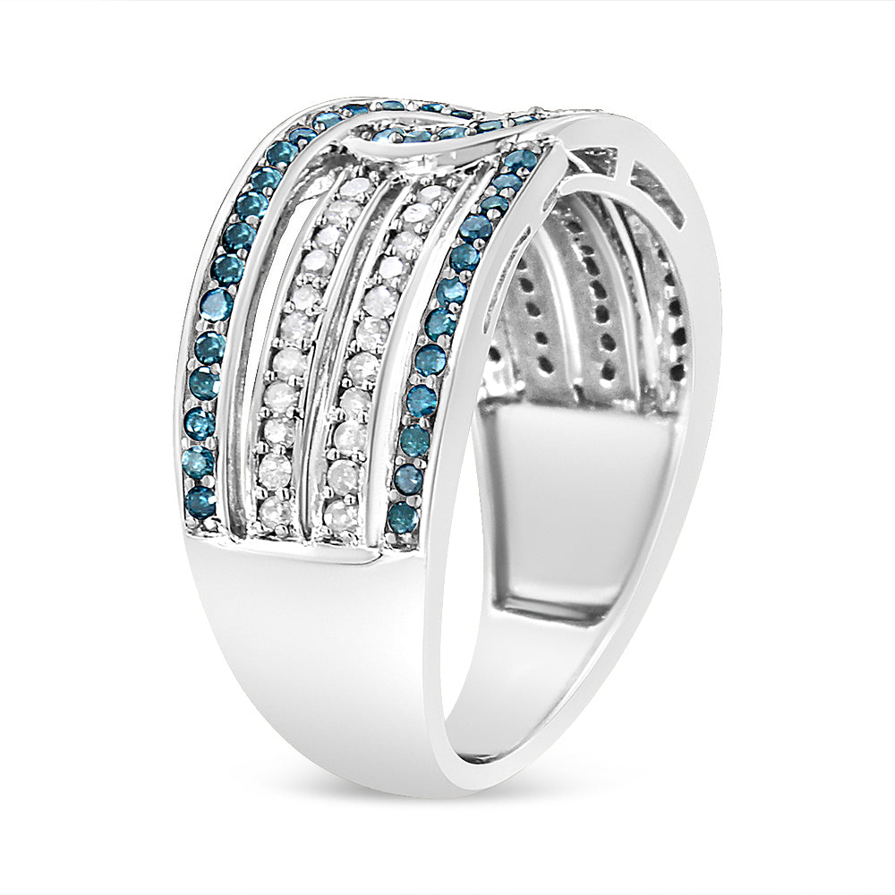 White metal ring with multiple rows of round white and blue gemstones in pave setting, shown at a slight side angle.