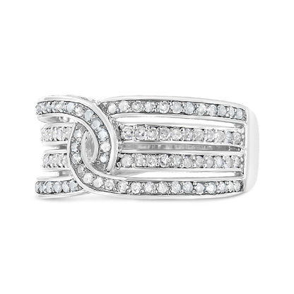 Close-up front angle of a white ring featuring multiple rows of round white gemstones in a shared prong setting forming a knot design.