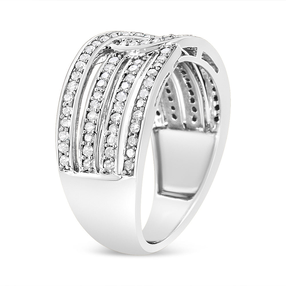 White metal ring with multiple rows of round white gemstones in a shared prong setting, shown at an angled side view.