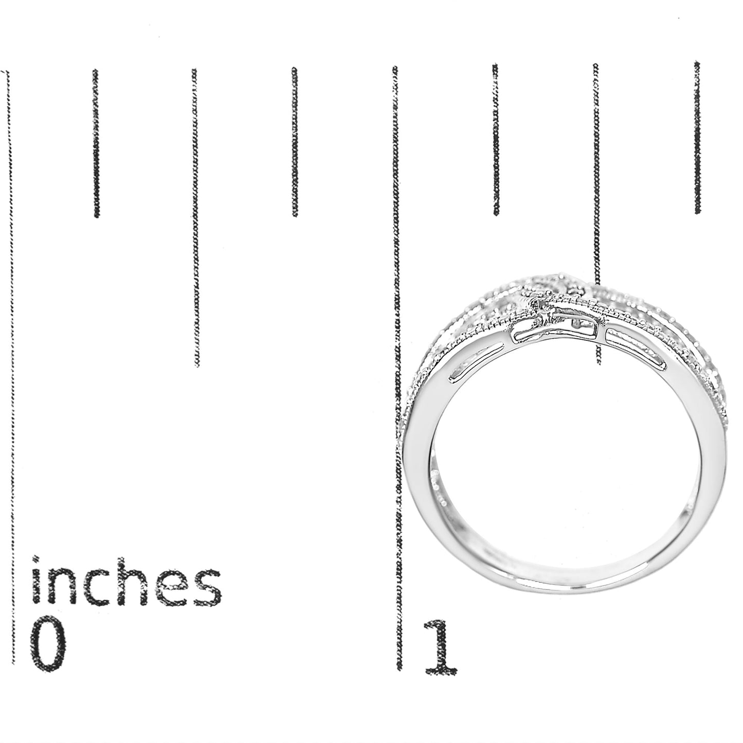 White metal ring with multiple rows of small round white gemstones in shared prong setting, shown from the side on a ruler for size reference.