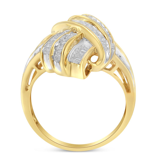 Close-up front angle of a yellow metal ring featuring an intertwined design with channel-set white round and baguette shaped gemstones.