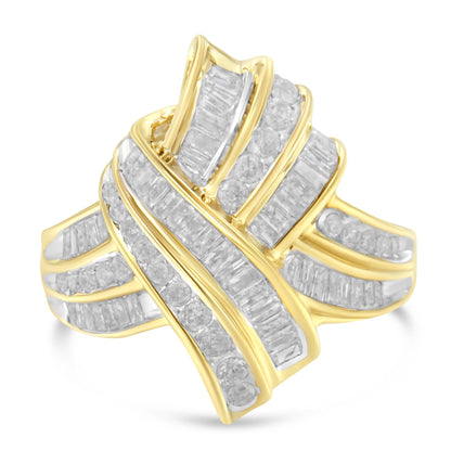 Yellow metal ring with intersecting bands set with white round and baguette-shaped gemstones in channel settings, shown in a close-up angled view.