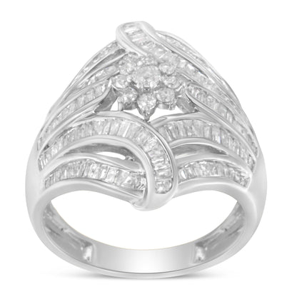 Front-facing white metal ring with a floral cluster of round white gemstones in prong settings and multiple bands of channel-set baguette white gemstones weaving around the design.