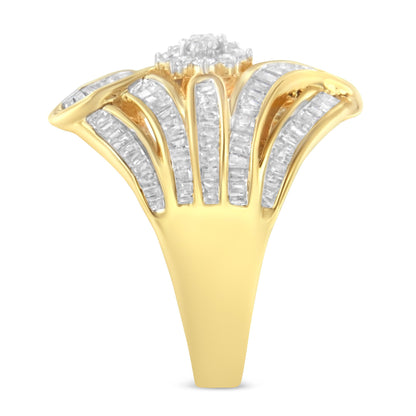 Front angle view of a yellow metal ring with a fan-shaped design featuring round white gemstones in prong settings at the center and multiple rows of baguette-shaped white gemstones in channel settings radiating outward.