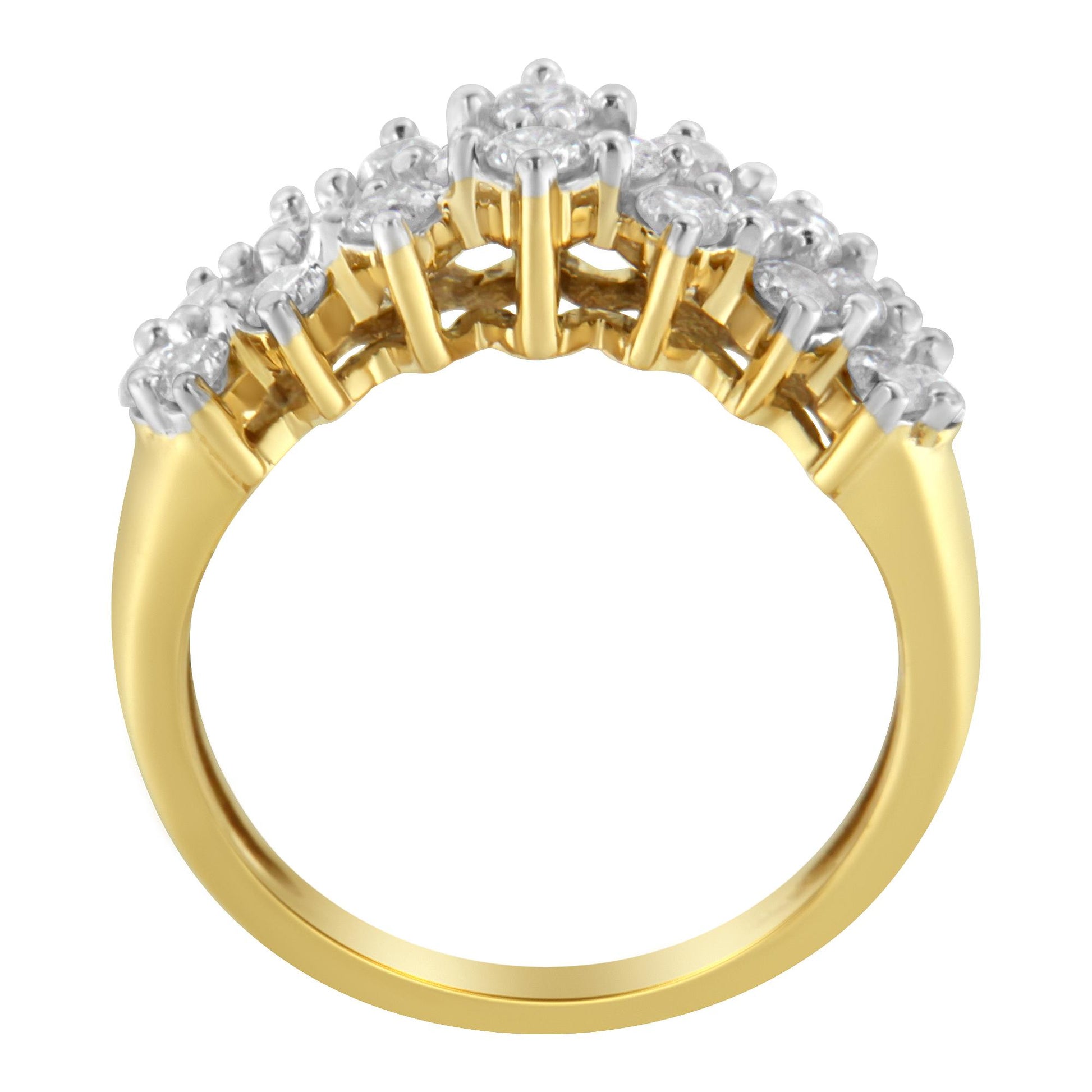 Yellow metal ring with multiple round white gemstones in prong setting, shown from a side angle.