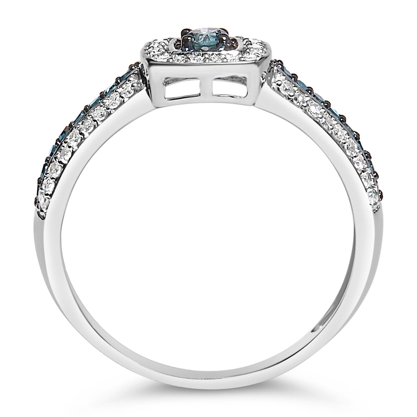 White metal ring with a central blue gemstone and smaller blue and white gemstones on the band, shown from a side angle on a white background.