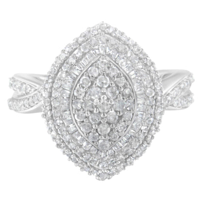 Top-front angle view of a white metal ring featuring clusters of round white gemstones in prong settings and baguette-shaped white gemstones in channel settings.