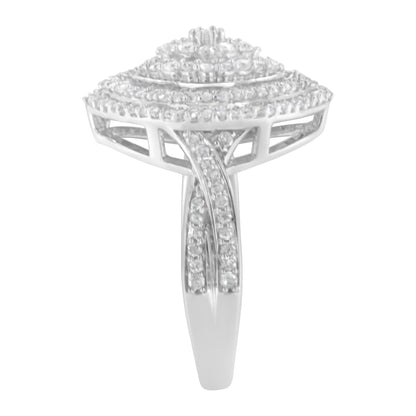 Front view of a white metal ring featuring an elevated square-shaped cluster design with multiple round white gemstones in prong settings and baguette-shaped white gemstones in channel settings along the band.