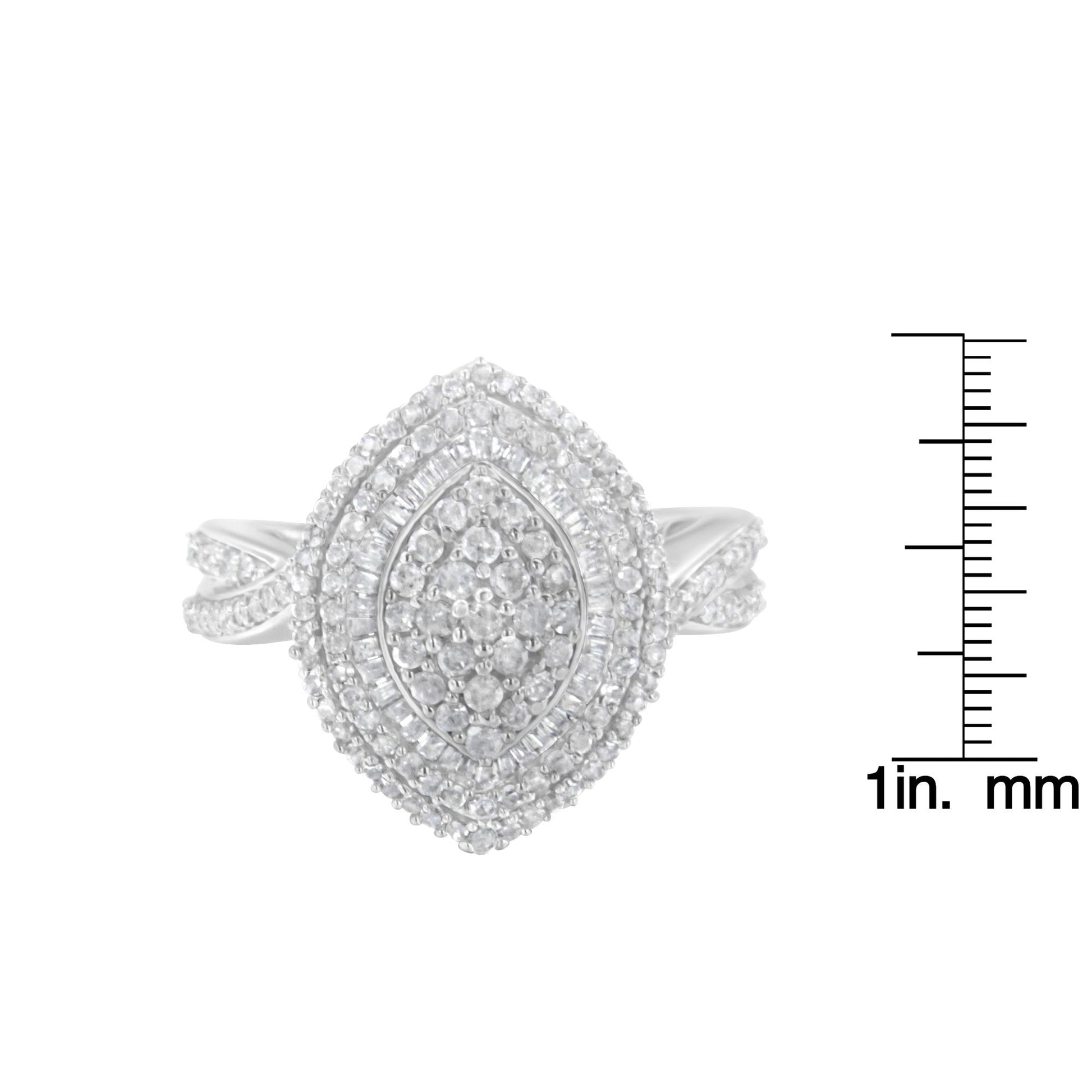Front view of a white metal ring featuring clusters of round and baguette white gemstones in prong and channel settings, shown next to a ruler for size reference.