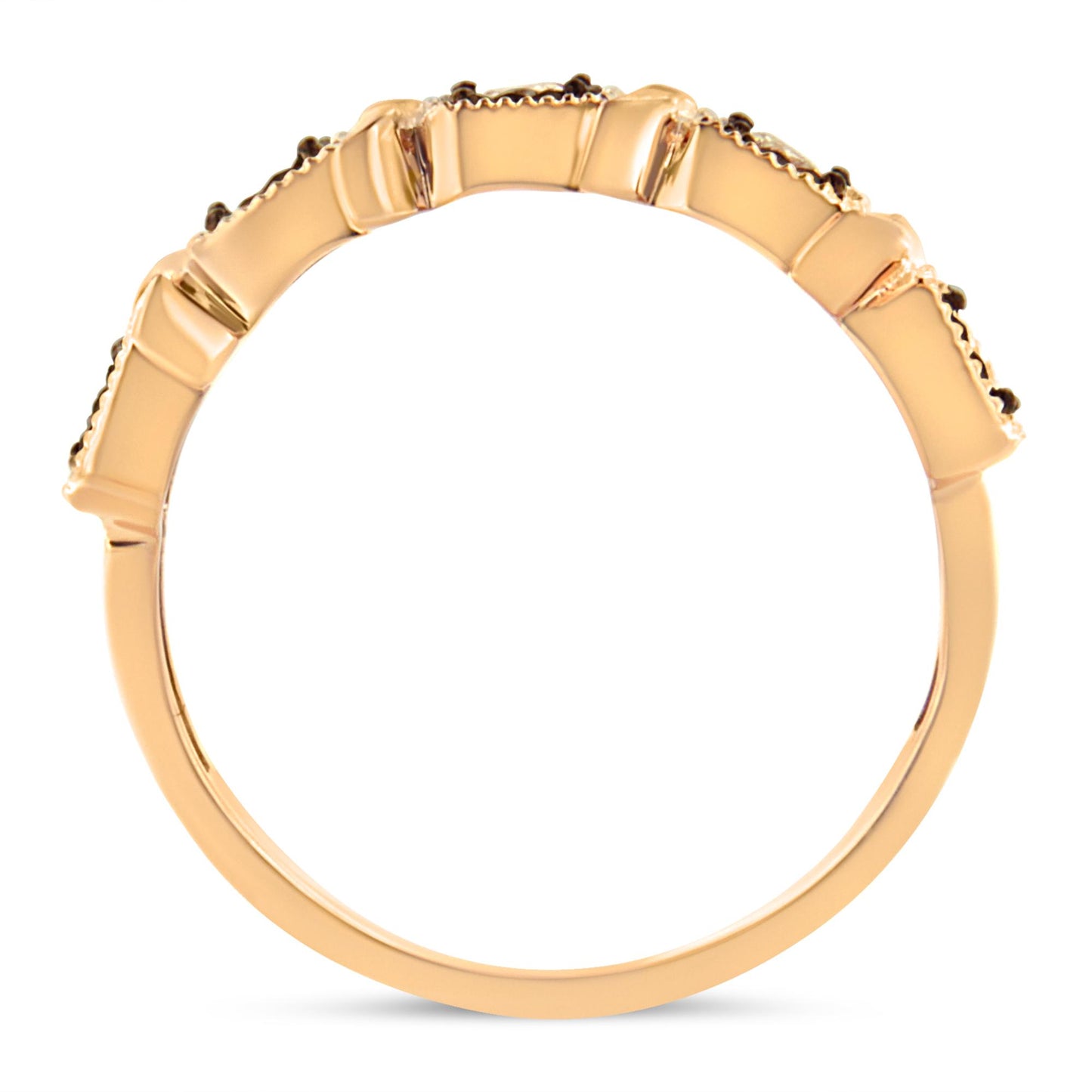 Side view of a rose-colored ring with five round white gemstones set in a row in miracle setting.