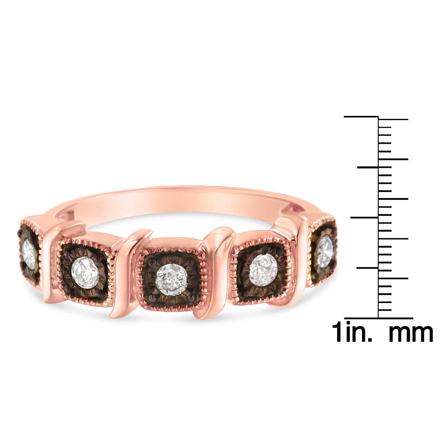 Rose and black metal ring with round white gemstones in miracle setting, shown from side angle, placed next to a ruler for size reference.