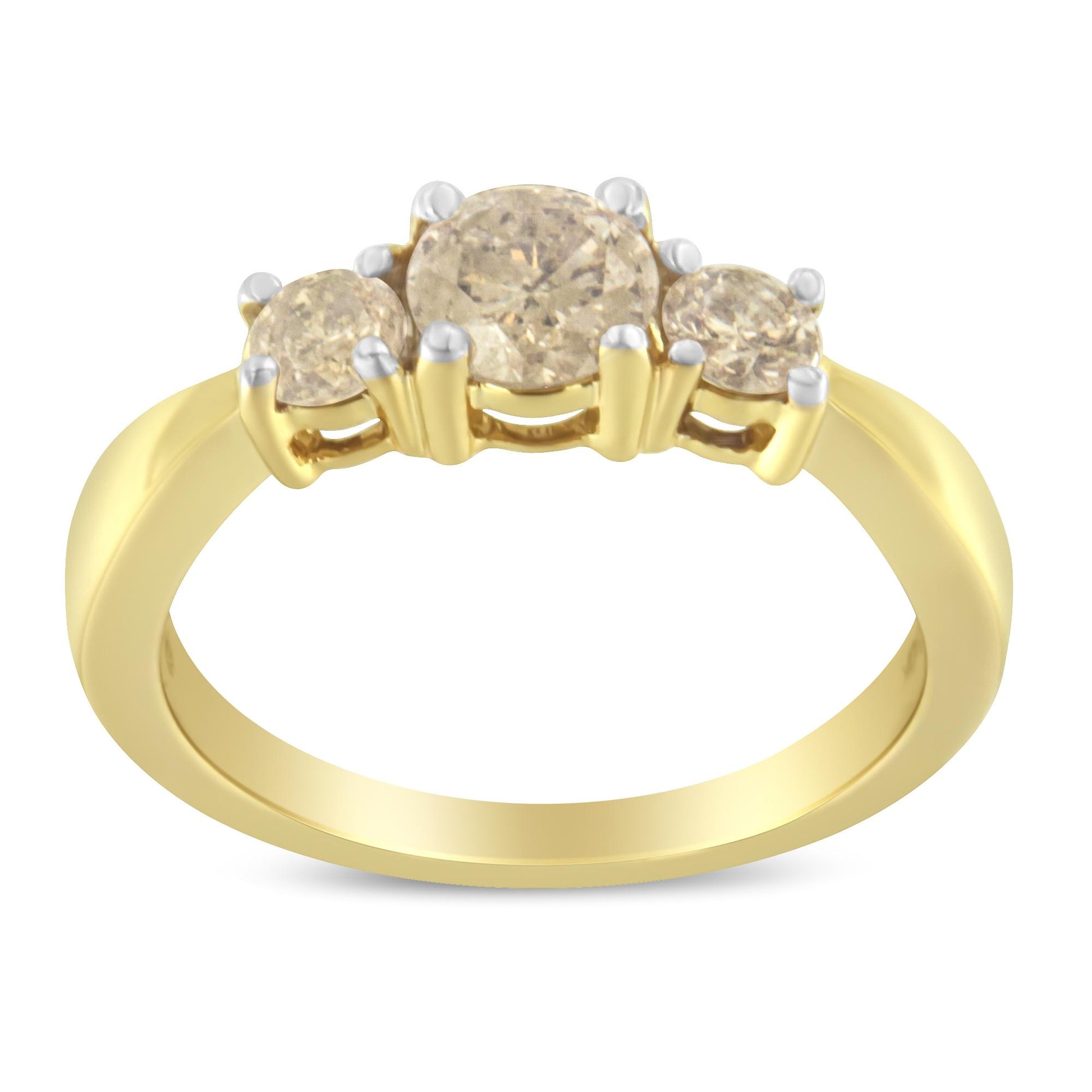 Front angle view of a yellow metal ring featuring one larger round white gemstone prong set between two smaller round white gemstones, also prong set.