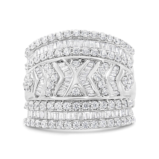 Front view of a wide white metal ring featuring multiple rows of round and baguette-shaped white gemstones in prong and channel settings with chevron and floral-inspired detailing.