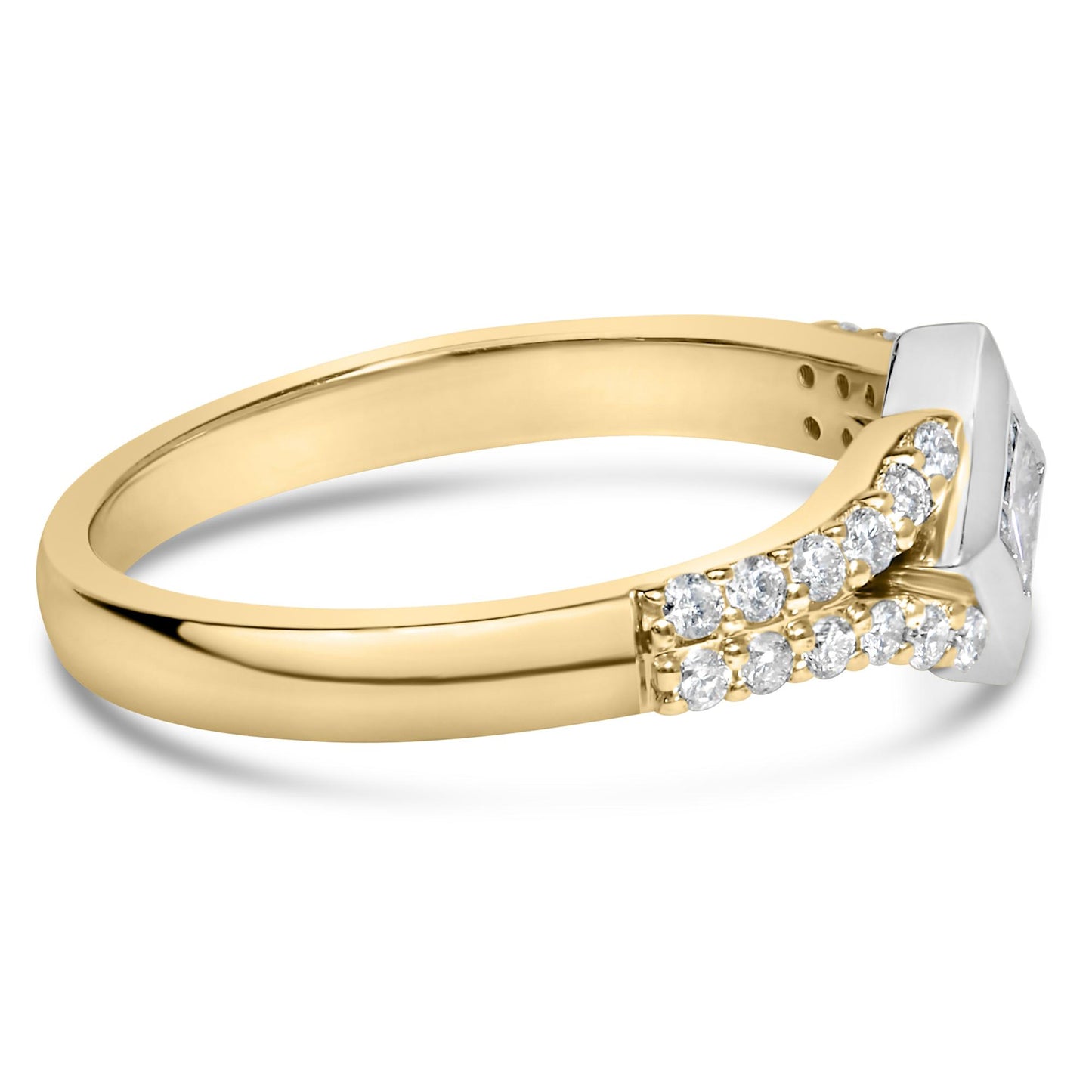 Side angle of a two-tone ring with a white gemstone in a princess shape set in a channel setting, accompanied by multiple round white gemstones in prong settings along the yellow band.