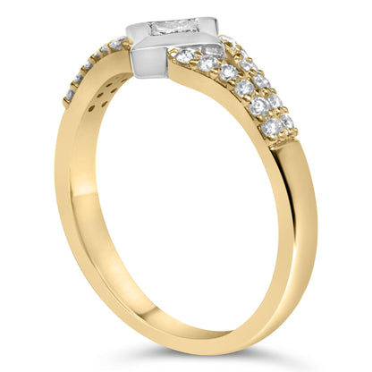 Ring with yellow and white metal, featuring a princess shape white gemstone in a channel setting and multiple round white gemstones in prong settings, shown at an angled side view.