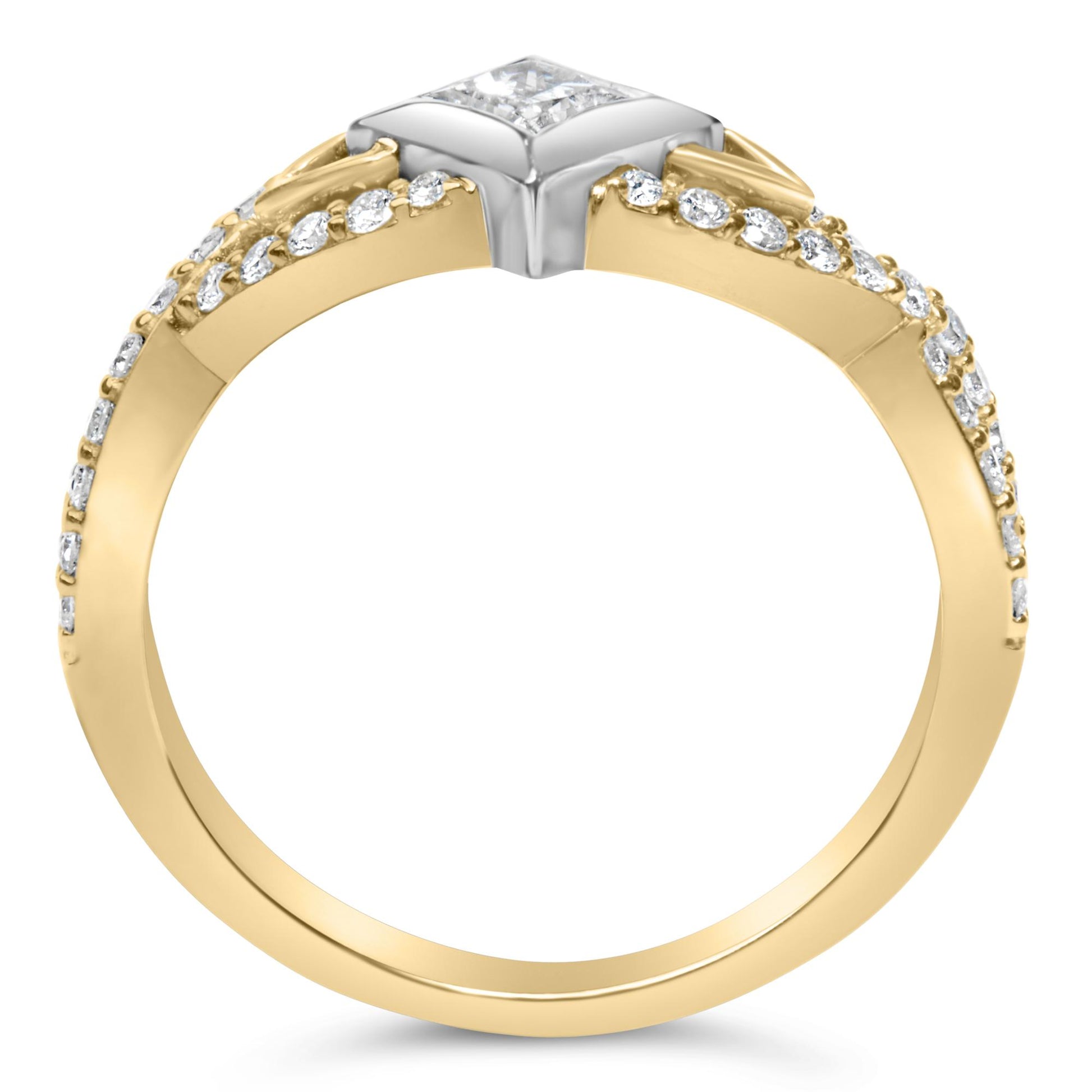 Close-up front angle of a yellow and white metal ring featuring a princess-shaped white gemstone in a channel setting at the center, flanked by multiple round white gemstones in prong settings along the band.