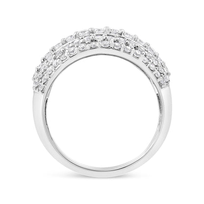 Close-up front angle of a white metal ring featuring multiple rows of round white gemstones in prong settings and a row of baguette white gemstones in channel settings around the upper half.