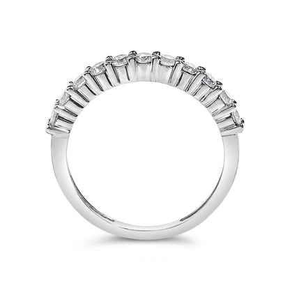 Close-up front view of a white metal ring featuring a curved row of round white gemstones set with prongs along the top.