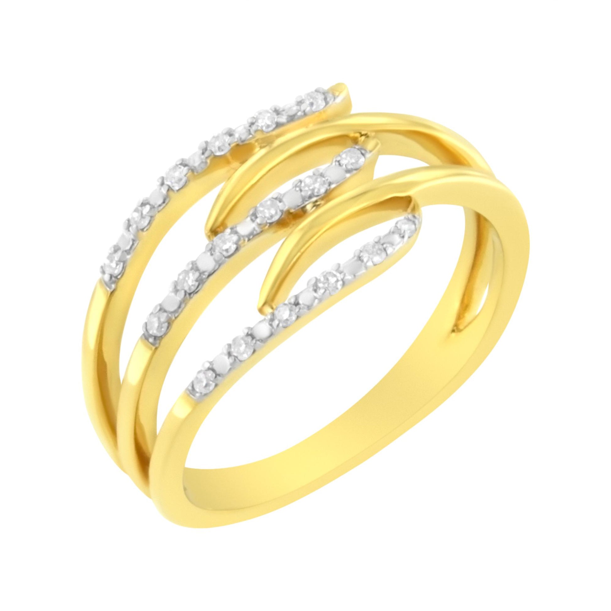 Yellow metal ring with three curved bands each set with round white gemstones in prong settings, angled view.