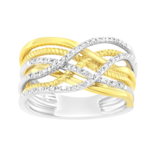 Front angle view of a ring featuring intertwined yellow and white metal bands, with white round gemstones set in prong settings on the white metal bands.
