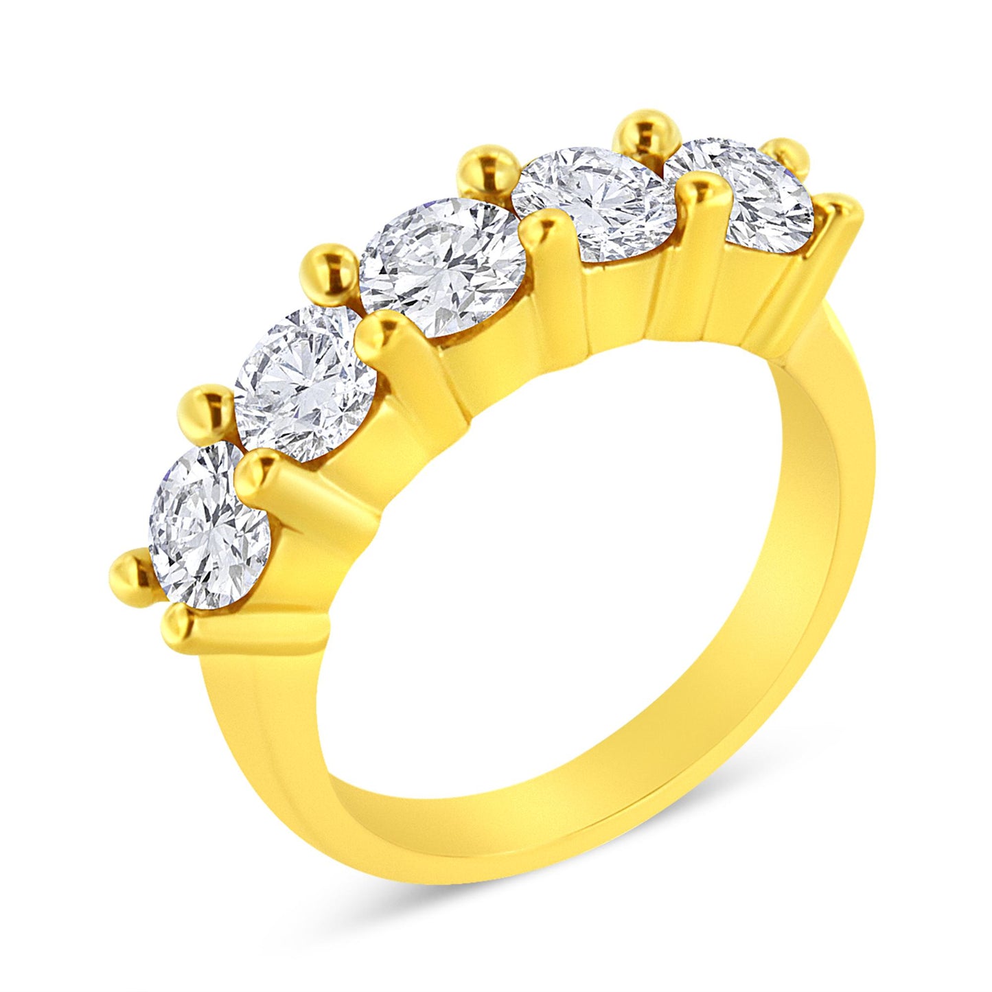 Close-up angled view of a yellow ring featuring five round white gemstones in prong settings aligned on the band.