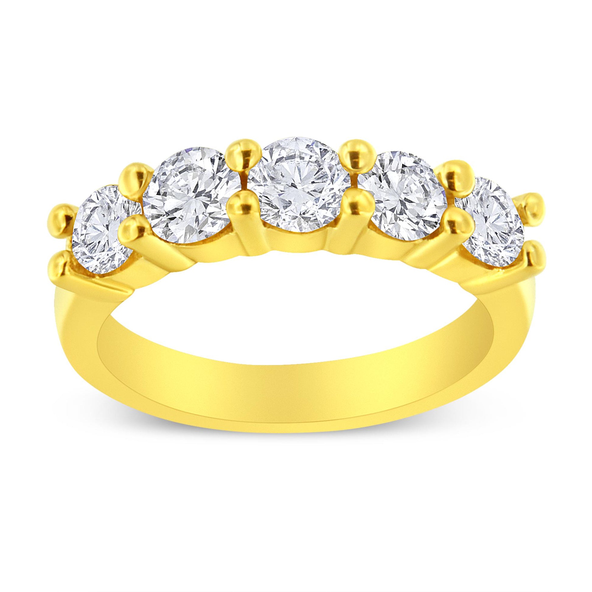 Yellow metal ring with five round prong-set brownish gemstones, shown from a front angle.