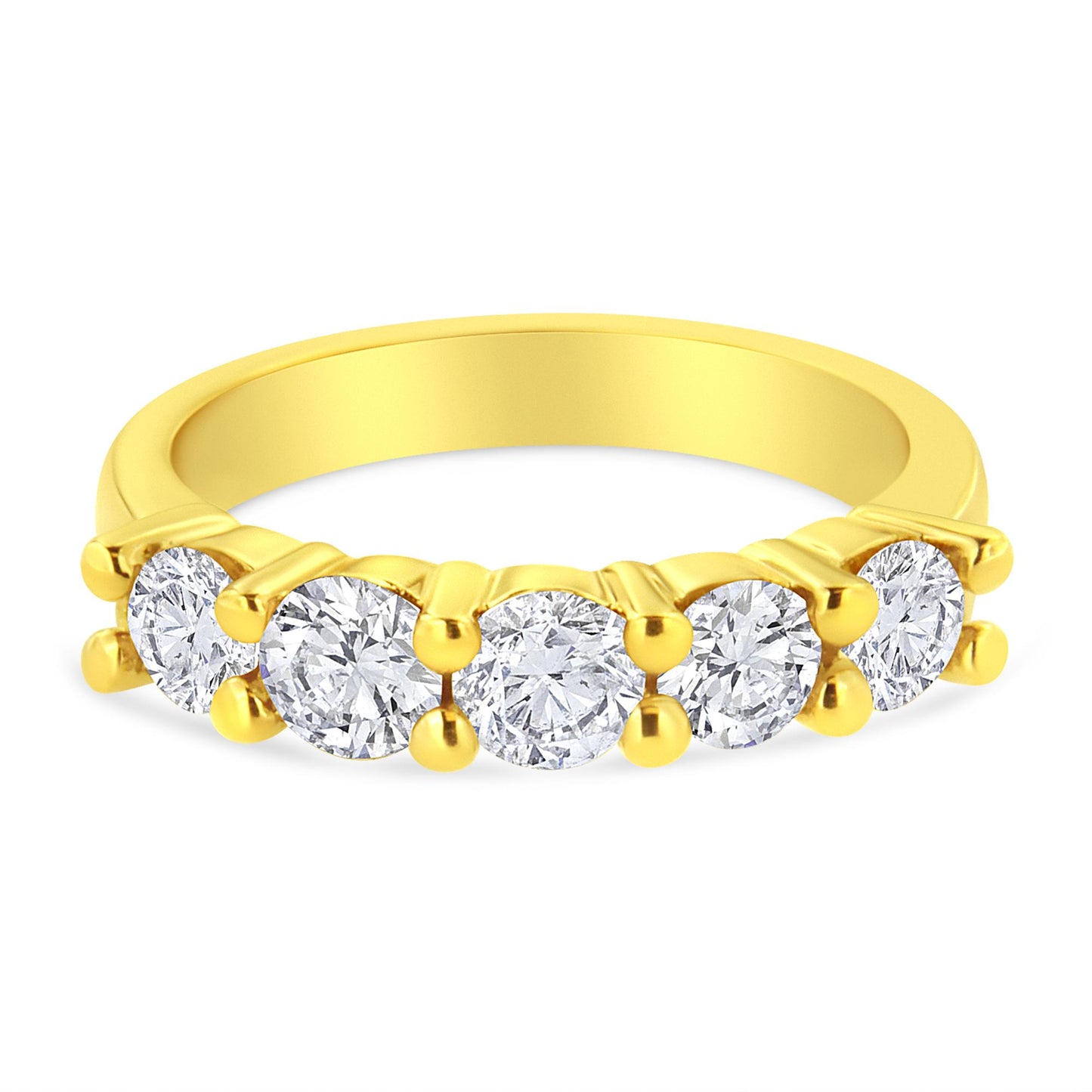Yellow metal ring with five round brownish prong-set gemstones, shown from a front angle.