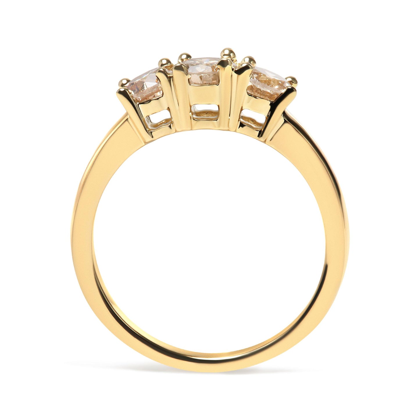 Yellow metal ring with three round white gemstones in prong settings, shown from the side angle.