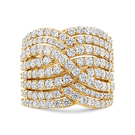 Close-up front view of a wide yellow ring featuring multiple rows of round white gemstones in prong settings arranged in an intricate overlapping pattern.