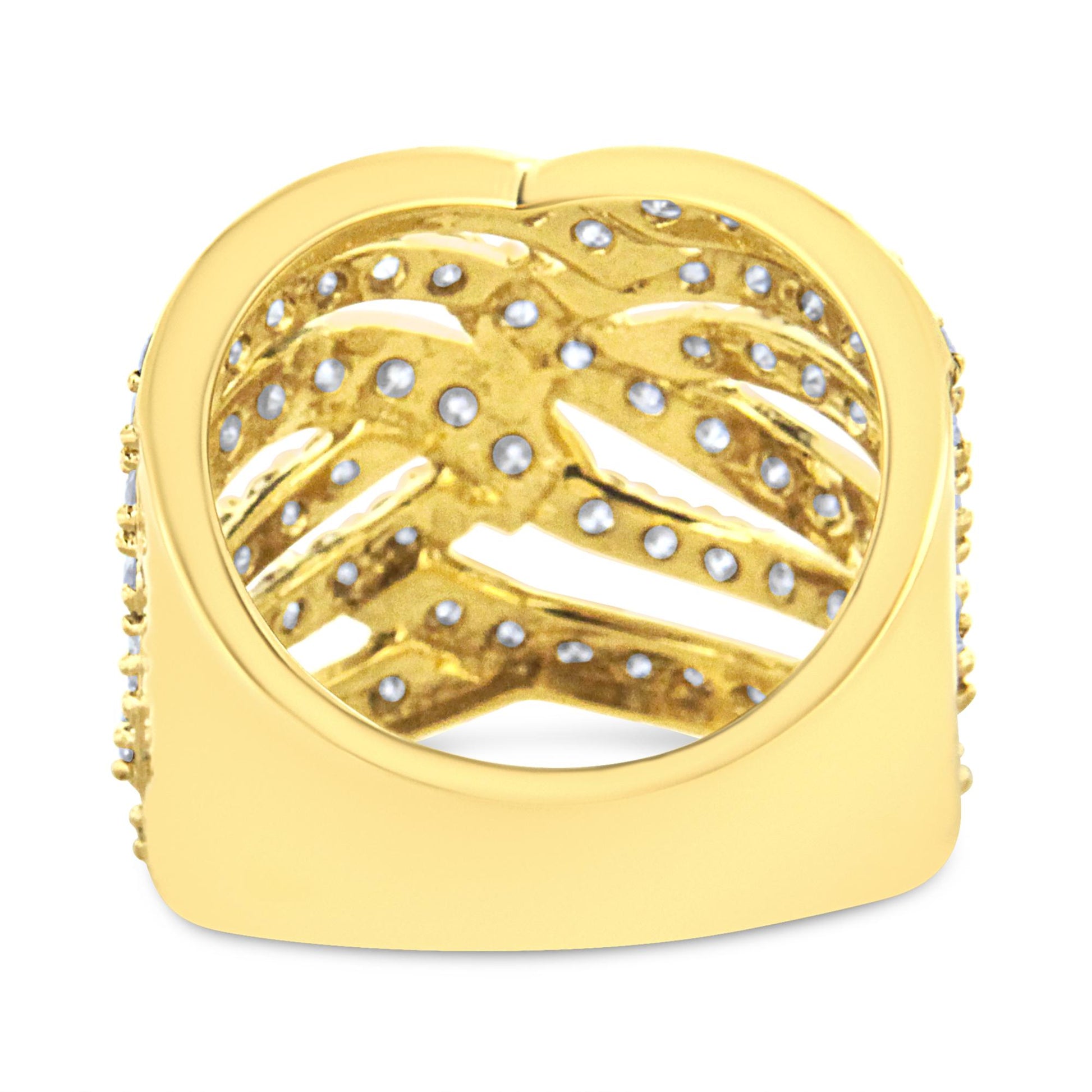 Yellow metal ring with multiple bands adorned with white gemstones in prong settings, shown from the top angle.