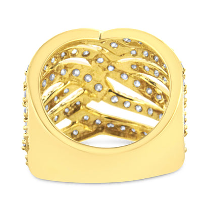 Yellow metal ring with multiple bands adorned with white gemstones in prong settings, shown from the top angle.
