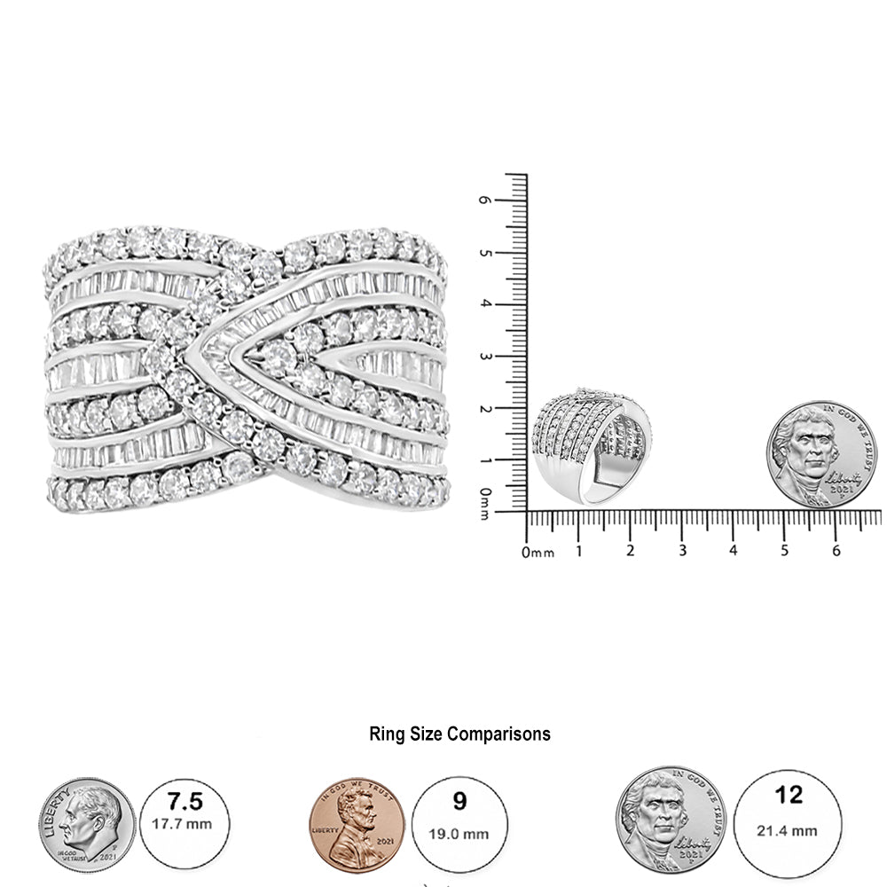 White metal ring with an intricate crisscross design featuring rows of round prong-set white gemstones and baguette channel-set white gemstones, shown in a front view next to a ruler and coin for size reference.