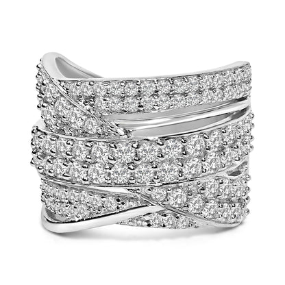 Close-up front angle of a white metal ring with multiple overlapping bands paved with round white gemstones in prong settings.